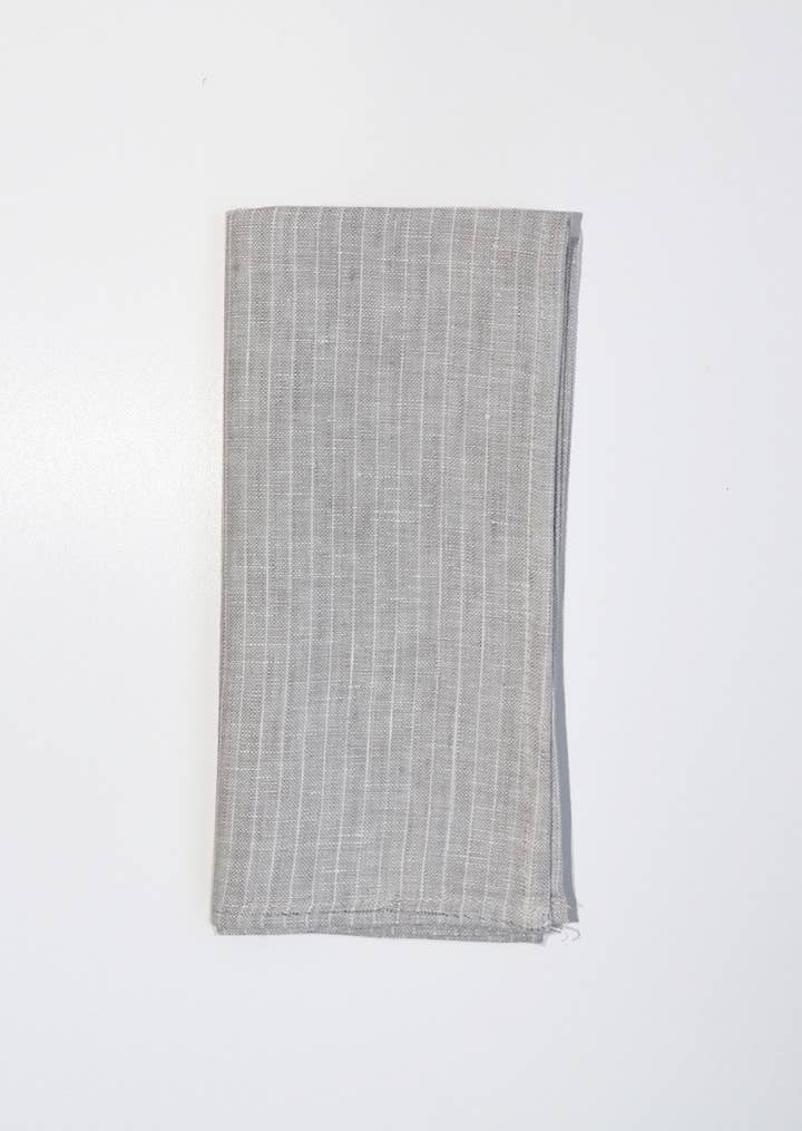 Gray textured towel on a white background