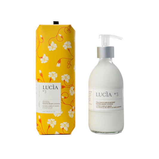 LucáÜa skincare product with yellow floral packaging on a white background
