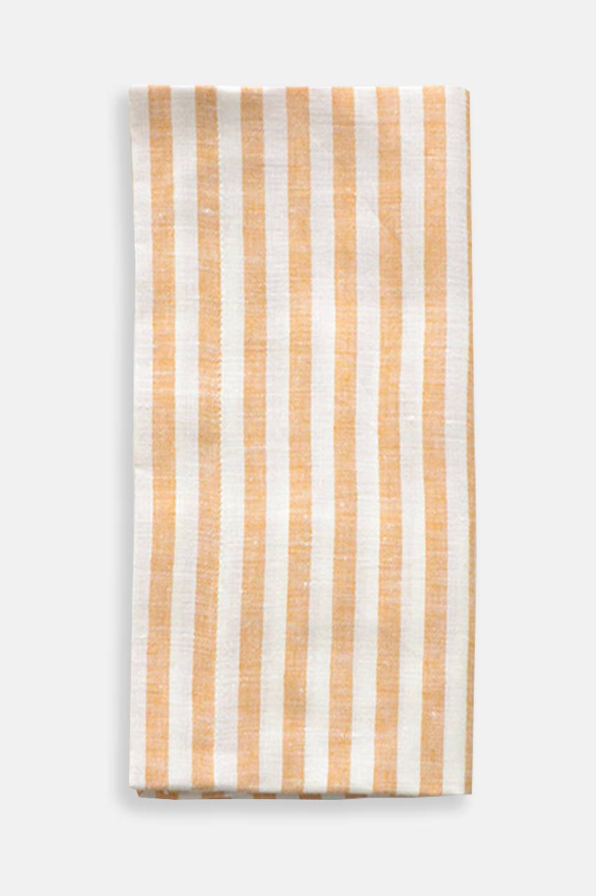 Striped fabric with orange and white vertical stripes on a white background